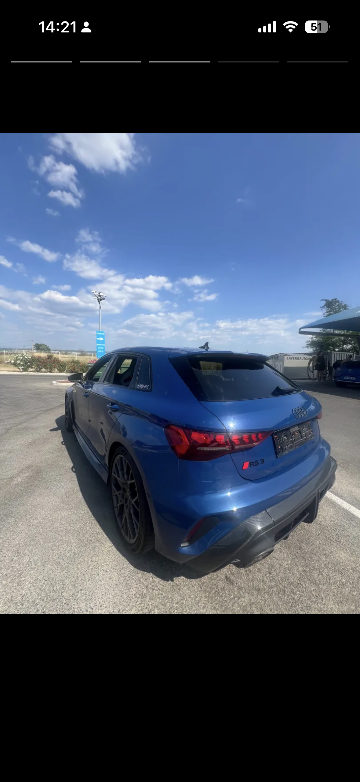 Audi RS3 2025 bleue 3/4 arriere